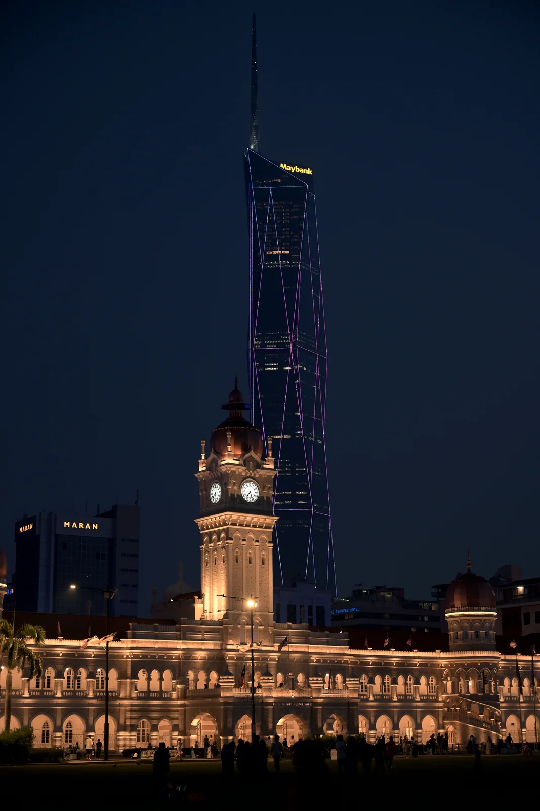 Sultan Abdul Samad Building clock tower with Merdeka 118 rising behind