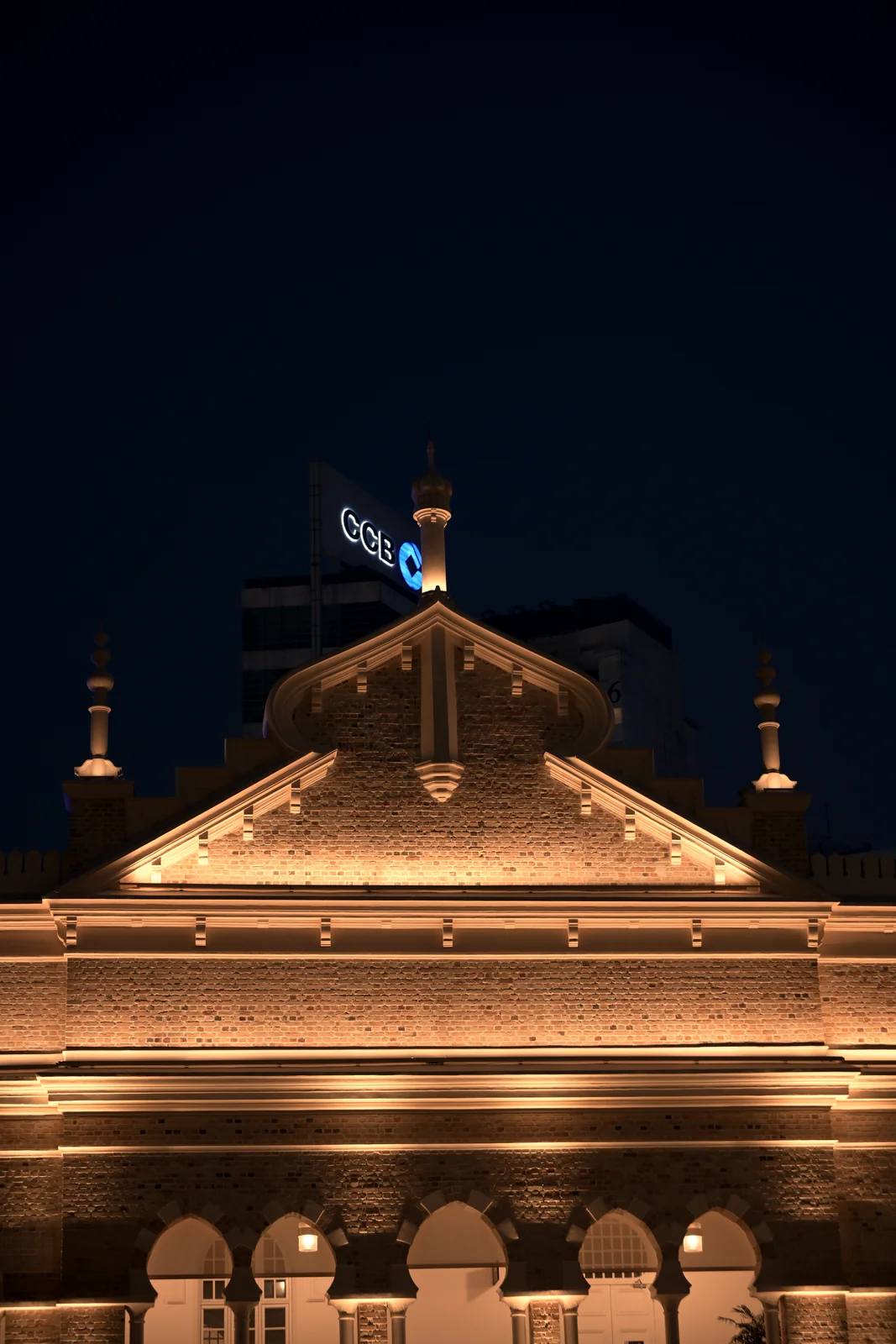 Moorish arches and warm amber roof lights of Sultan Abdul Samad Building