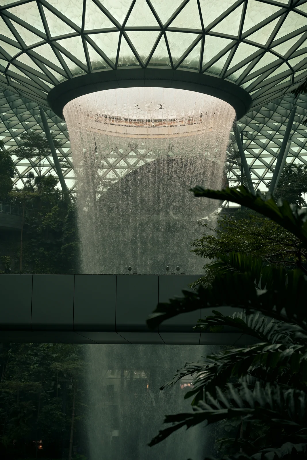 Jewel Changi Rain Vortex waterfall cascading from circular dome skylight