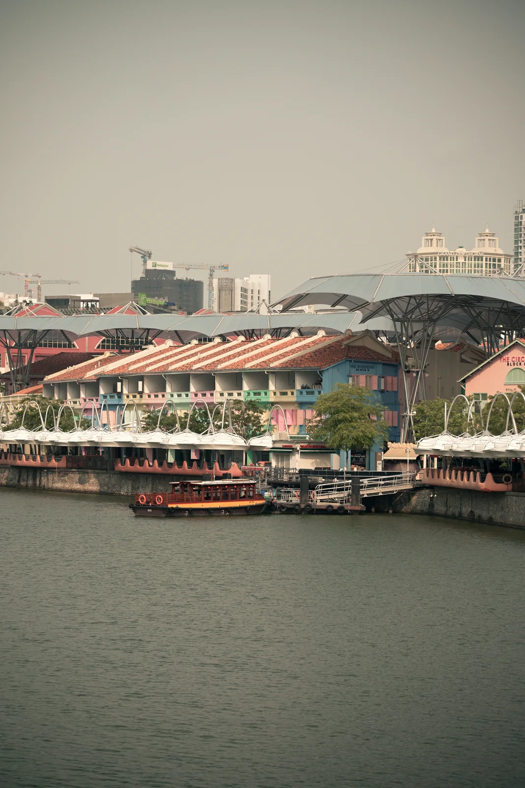 Singapore River waterfront promenade and Clarke Quay daytime view