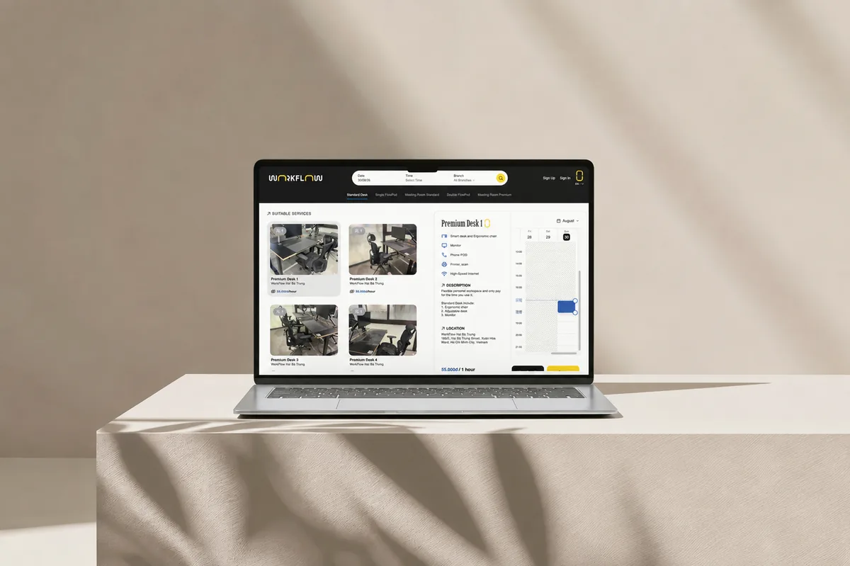 WorkFlow Space booking website shown on a laptop